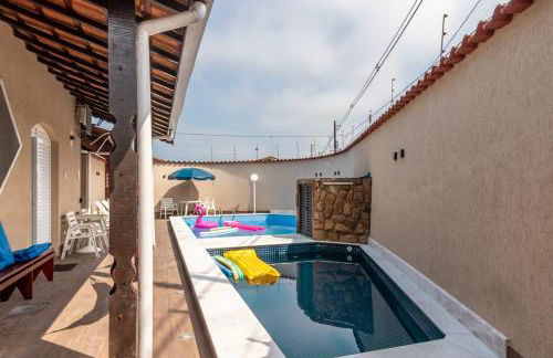 Casa Lindíssima e Espaçosa com 2 Piscinas - Adulto e Infantil, Perto da Praia, Opção da Piscina Adulto Aquecida Cobrado à Parte, 4 Quartos Frente as Piscinas, Área Gourmet Completa com Churrasqueira, Forno e Fogão a Lenha, Mesa de Bilhar, Lareira na Sala - Photo 11