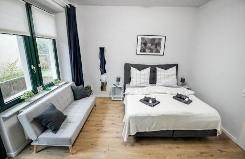 Ferienwohnung Lorenz mit kostenlosem Parkplatz Boxspringbett Küche - Foto 3