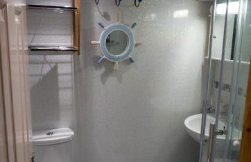 Enlli Fach cabin sleep's 2 adults and 2 children 2 dogs welcome not suitable for contract workers due to parking height restrictions - Photo 12