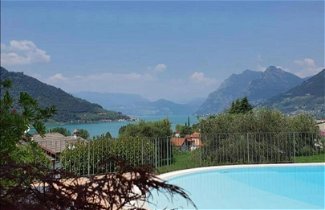 Foto 1 - Apartamento em Sale Marasino com piscina privada e vista para o lago
